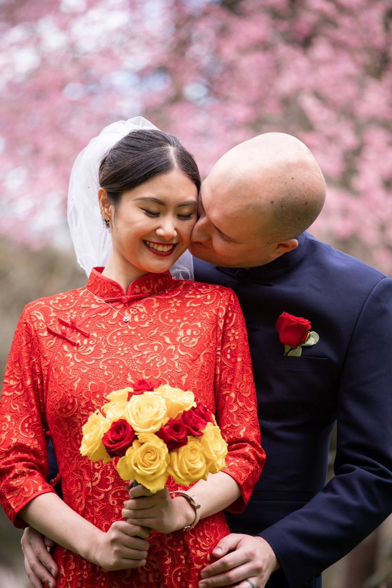 This couple honors the bride's Asian heritage with their wedding attire