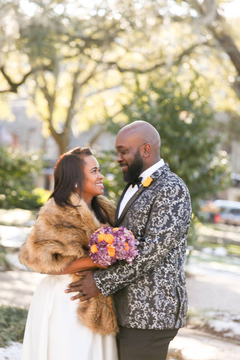Winter elopement in Chatham Square with well dressed black couple