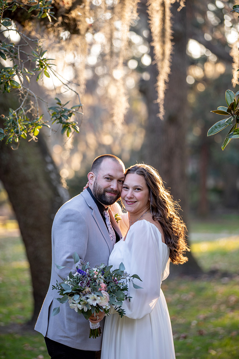 Couple backlit during the golden hour in Forsyth Park.