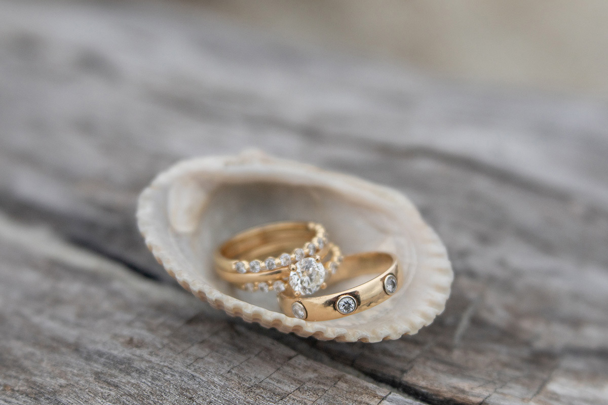 Gorgeous wedding rings in a shell on Tybee Island elopement