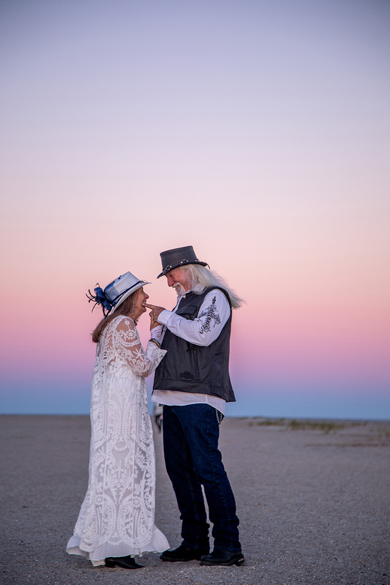 Older couple just married at sunset on Tybee Island